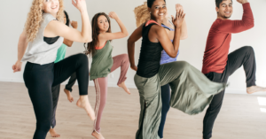 happy people doing cardio yoga